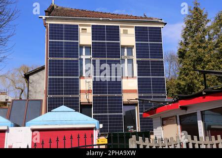 Cracow. Krakow. Poland. Solar panels placed on the wall of a building, vertically mounted. Power source. Stock Photo