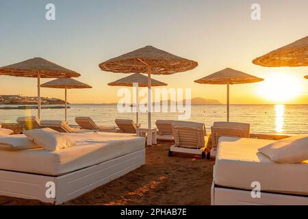 View of luxury tropical beach during sunset. Tourism and travel. Stock Photo