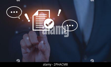 Document management system concept. Businessman touching document software icon folder. Search and manage document database files online. Stock Photo