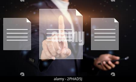 Businessman touching the virtual screen with a folder icon. Online documentation management. Stock Photo