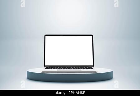 Laptop with white screen on colored pedestal and blue background, Stock Photo