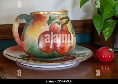 Close-up of an antique 1903 hand painted cider pitcher, USA Stock Photo