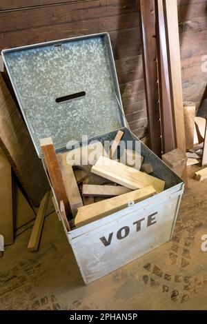 Still life of firewood, kindling in an old ballot box in a home workshop, 2023, Bucks County, Pennsylvania, USA Stock Photo