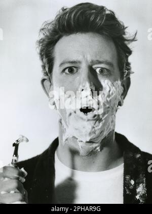 JUDGE REINHOLD in VICE VERSA (1988), directed by BRIAN GILBERT. Credit