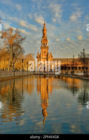 Legendary view of famous Plaza de Espana. Spanish square in the centre of old but magnificent Seville, Spain. Unique moorish architecture. Stock Photo