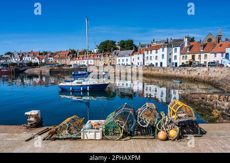 Lobster pots on quayside at St Monans harbour in East Neuk of Fife, Scotland, UK Stock Photo