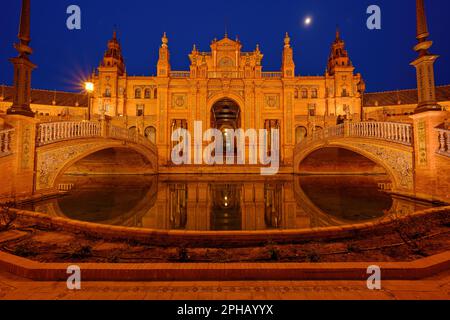 Legendary view of famous Plaza de Espana. Spanish square in the centre of old but magnificent Seville, Spain. Unique moorish architecture. Stock Photo