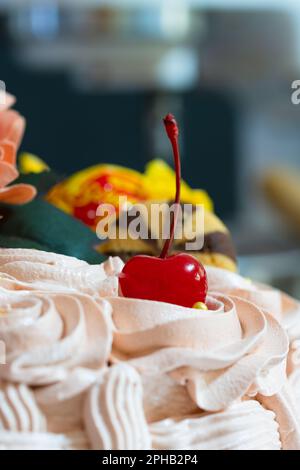Basket-shaped cake with sweets, cookies and flowers,Easter marks the end of Holy Week, known in the United States as Spring Break Stock Photo