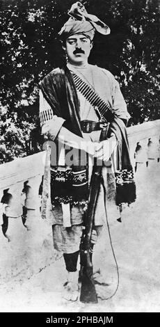 The image is of King Amanullah Khan in tribal dress complete with Brith 303 rifle who was the King of Afghanistan from June 1926 until January 1929 Stock Photo