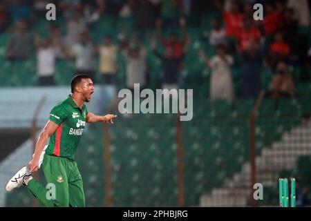 Taskin Ahmed celebrates one of his four wickets as Bangladesh win against Ireland by 22 runs (DLS method) in the first T20I of the three-match series Stock Photo