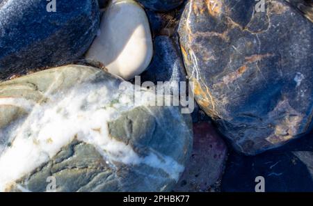 Abstract Background with Round Pebble Stones. Vacation Holiday Recreation on Beach Concept. High Quality Photo. Stock Photo