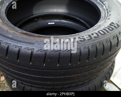 Itterbeck, Germany - March 26 2023 A stack of Bridgestone tires Stock Photo