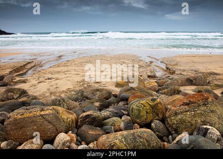 Colourful stones on beach Stock Photo