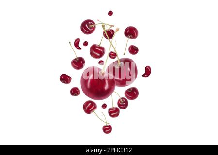 cherries falling on a white background Stock Photo