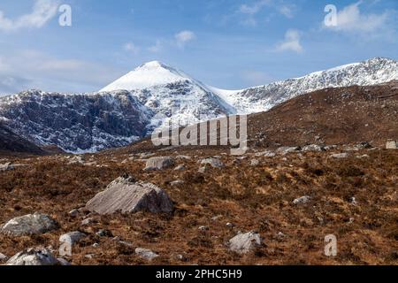 Foinaven (Scottish Gaelic: Foinne Bheinn) is a mountain in Scotland, situated in the far north-west corner of the Scottish Highlands. Stock Photo
