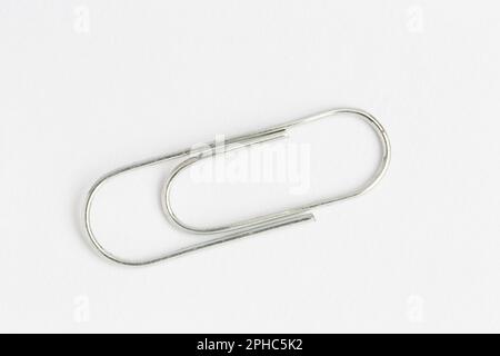 Paper clip on a white background Stock Photo