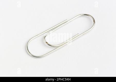 Paper clip on a white background Stock Photo