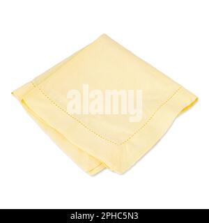 Folded salmon color tissue napkin isolated over white background. Stock Photo