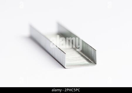 Close up of a bar of metal office staples Stock Photo