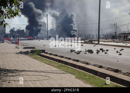 Nairobi, Kenya. 27th Mar, 2023. Car tires burn during a demonstration called by Azimio party leader Raila Odinga over the cost of living and president William Ruto's administration. (Photo by John Ochieng/SOPA Images/Sipa USA) Credit: Sipa USA/Alamy Live News Stock Photo