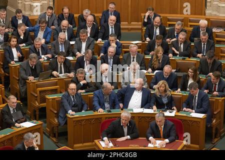 Budapest, Hungary. 27th Mar, 2023. Members of the Hungarian parliament vote on Finland's accession to NATO in Budapest, Hungary, on March 27, 2023. The Hungarian parliament on Monday approved legislation allowing Finland to join the North Atlantic Treaty Organization (NATO). Credit: Attila Volgyi/Xinhua/Alamy Live News Stock Photo