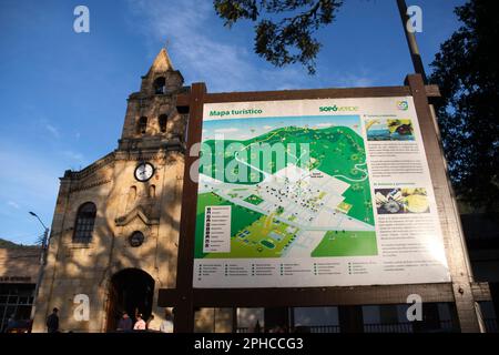 January 22, 2023, Sopo, Cundinamarca, Colombia: Tourist map in the main square of the town, Tibas Square. Behind, the facade of the Divine Savior Pari Stock Photo