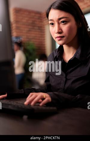 System engineer working on programming project for the company data center, focusing on process of developing software. Freelance coder working on cyber security innovation in it agency. Stock Photo