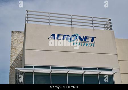 Houston, Texas USA 03-19-2023: Aeronet Worldwide business exterior facade and sign in Houston, TX. Global logistics freight company founded in 1982. Stock Photo