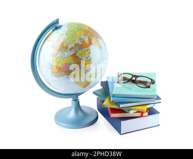 Plastic model globe of Earth, books and eyeglasses on white background. Geography lesson Stock Photo