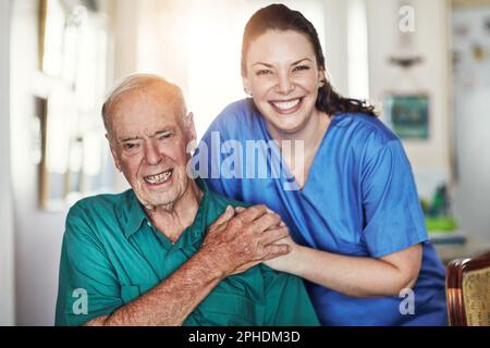 Shes the best. Cropped portrait of a female nurse standing next to her senior male patient. Stock Photo