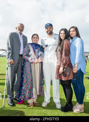 FILE PICS. Picture by Allan McKenzie/SWpix.com - 23/08/2016 - Cricket - Specsavers County Championship - Yorkshire County Cricket Club v Nottinghamshire County Cricket Club - North Marine Road, Scarborough, England - Azeem Rafiq with his family after being presented with his Yorkshire county cap. Stock Photo