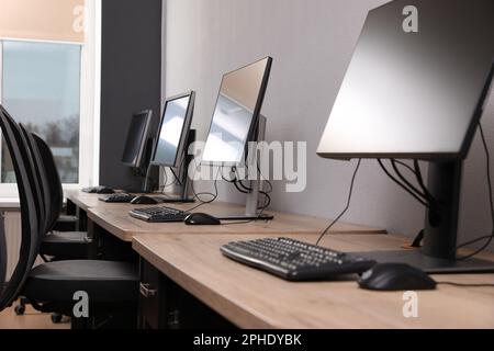 Many modern computers in open space office Stock Photo
