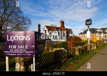 Southborough, Kent, England. For Sale by Auction sign in front of the former The Weavers pub / restaurant, a historic 16th century Wealden Hall farmhouse that has recently been put up for sale. It is a Grade II Listed Building and one of the most significant historic buildings in Southborough. The auction is due to be on April 26th 2023, the site has a Guide Price of £950,000 Freehold. The current occupants, the Imli Indian Restaurant, have recently closed due to being unable to afford a rent increase. Stock Photo