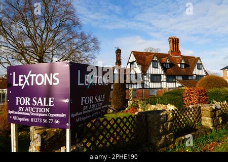 Southborough, Kent, England. For Sale by Auction sign in front of the former The Weavers pub / restaurant, a historic 16th century Wealden Hall farmhouse that has recently been put up for sale. It is a Grade II Listed Building and one of the most significant historic buildings in Southborough. The auction is due to be on April 26th 2023, the site has a Guide Price of £950,000 Freehold. The current occupants, the Imli Indian Restaurant, have recently closed due to being unable to afford a rent increase. Stock Photo