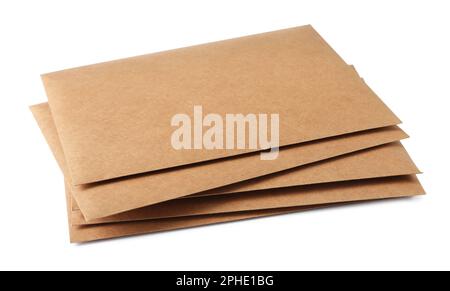 Stack of brown letters on white background Stock Photo