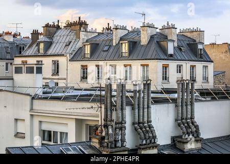 Typical Parisian attic windows and rooftops Stock Photo - Alamy