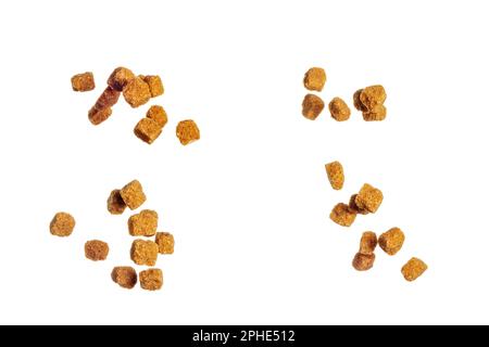 Falling Brown cane sugar cubes isolated on white background, full depth of field Stock Photo