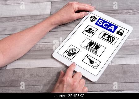 Sca concept shown on a tablet used by a woman Stock Photo