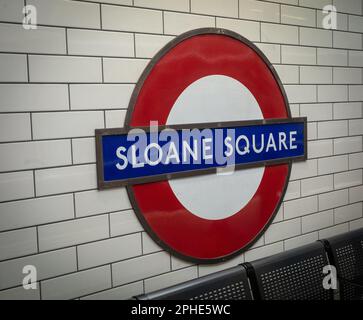 The iconic London Underground station name design for Sloane Square tube station in southwest London. The London Underground roundel, was designed by Stock Photo
