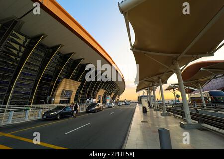 Jeddah , Saudi Arabia - Mar 11 2023 : Passengers traveling through King Abdulaziz International Airport - flight  and booking concept Stock Photo