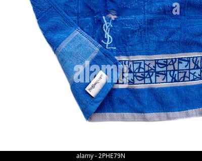 Yves Saint Laurent Used hand towel.Yves Saint Laurent YSL (also known as Saint Laurent Paris) is a luxury fashion house founded by Yves Saint Laurent. Stock Photo