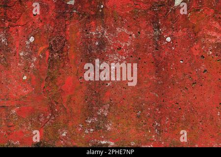 Worn red concrete wall surface as grunge texture and background Stock Photo