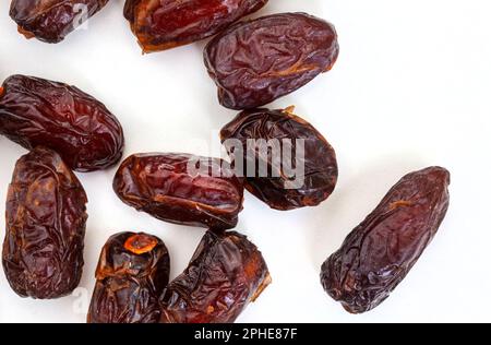 Delicious, dried dates isolated on white background Stock Photo