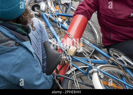 Brussels, Belgium. 28th Mar, 2023. Chained bicycles pictured during a protest action of the collective 'No future for the agro-industry' in the framework of the Forum for the Future of Agriculture (FFA), in Brussels, on Tuesday 28 March 2023. BELGA PHOTO NICOLAS MAETERLINCK Credit: Belga News Agency/Alamy Live News Stock Photo