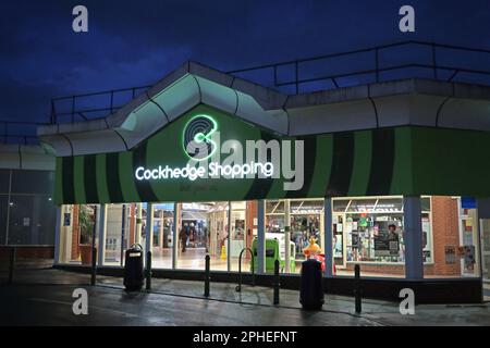 Entrance to the Cockhedge Shopping Centre & Asda superstore, 17 Cockhedge Way, Warrington, Cheshire, England, UK,  WA1 2QQ, at dusk Stock Photo