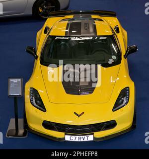 Aerial view, looking down on  a Yellow, 2016, Chevrolet Corvette Z06, C7.R edition, on display at the 2023 London Classic Car Show Stock Photo