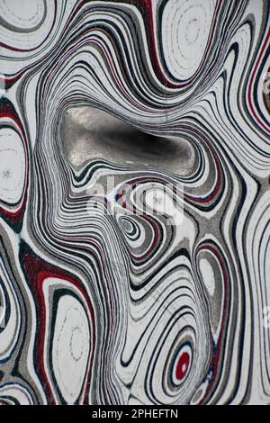 Fordite, also known as Motor or Detroit Agate, is a unique automotive enamel material with an interesting history. The original layered automotive pai Stock Photo