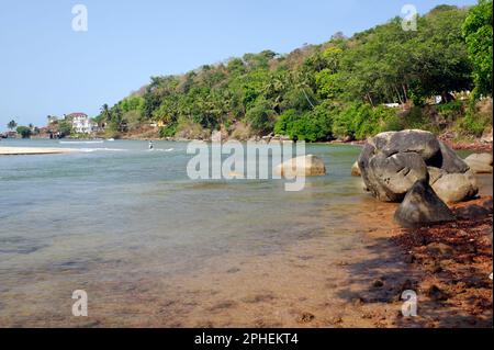 View of a rocky seashore of Vengurla district Sindhudurga state Maharashtra India Stock Photo