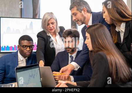Group of financial agents working during market and stock exchange analysis, trading and business people lifestyle Stock Photo