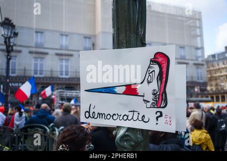 Paris, France. March 25, 2023. Sign saying 'democracy?' in French in a Protest against the pension reform outside the Palais-Royal. Stock Photo